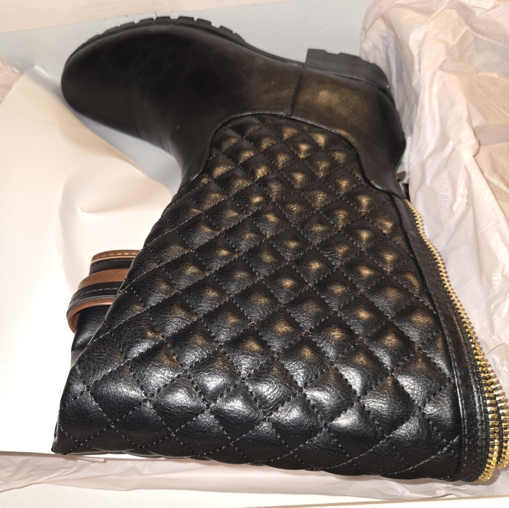 Black boots with brown trim